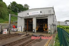 PHOTO  CLASS 158 158825 AND CLASSMATE ON MACHYNLLETH DEPOT 030624