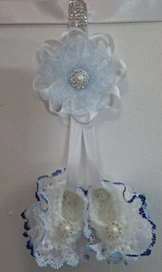 Pram charms*new* white  booties Baby charms hand knitted with blue Lace And Bow
