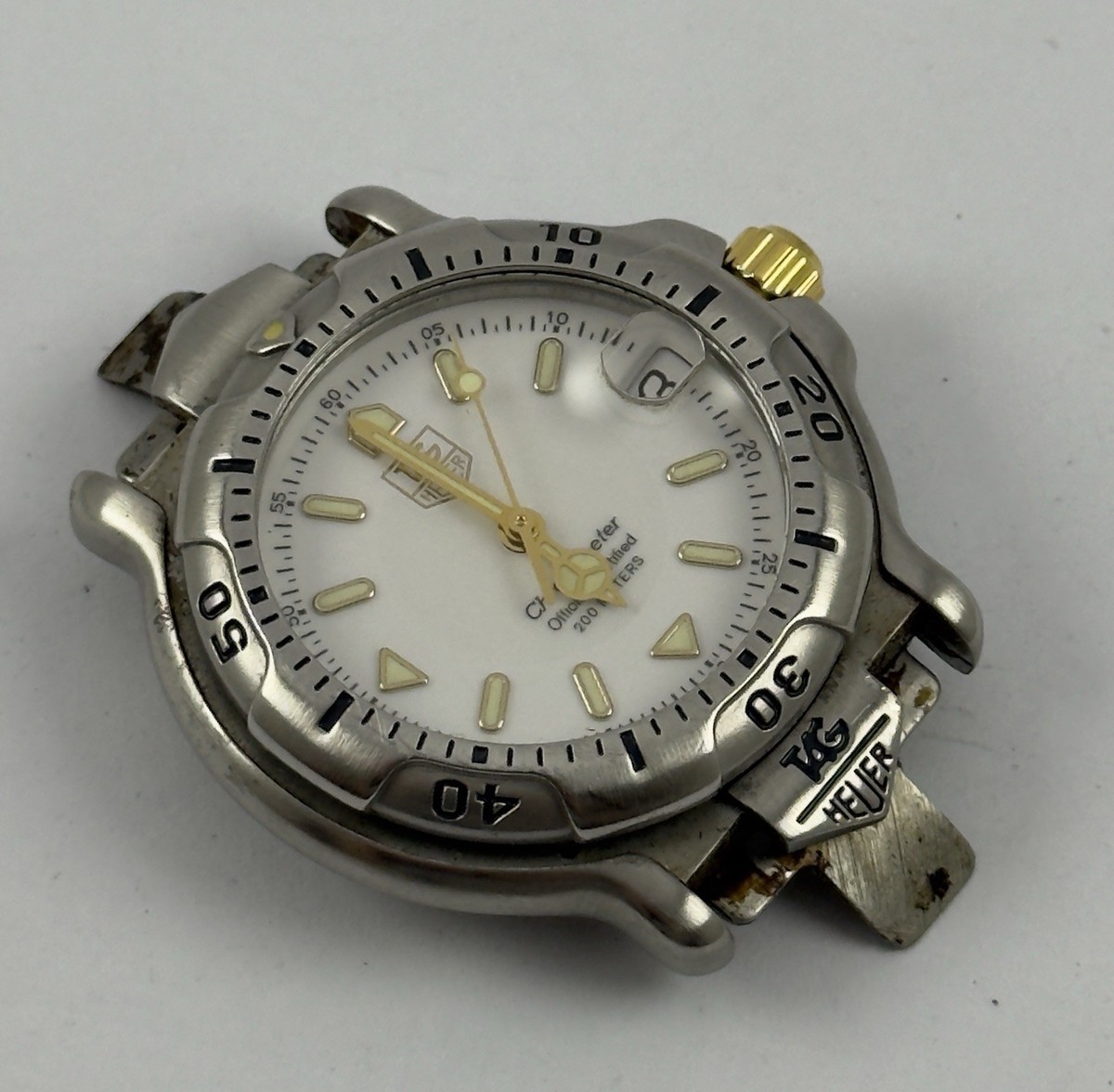 TAG Heuer 6000 WH5251-K1 Automatic The gold part under the bezel