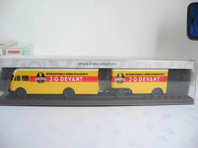 HS102* Brenika 1:87 018355 Lanz Eil-Bulldog mit 2 Anhängern OVP - Bild 1 von 3