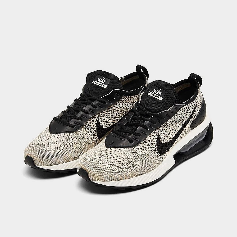 200 flyknit black hotsell