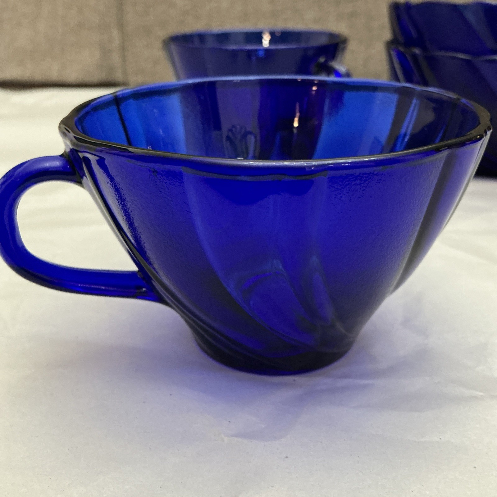 Four Pieces Of Cobalt Blue France Produced Serve Ware. 2 Berry Bowls And 2 Cups
