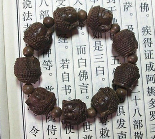 Duftendes Agarholz Schnitzerei Gautama Buddha Kopf Buddhistische Gebetsperle Mala Armband - Bild 1 von 4