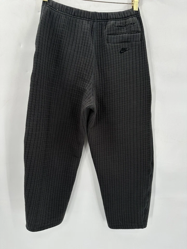 Pantalones de chándal Nike Sportswear Therma-FIT ADV Tech polar gris M's S pierna ancha Foto 4 de 4