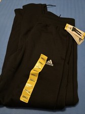 adidas Women  s Relaxed Fit Tapered Legs Fleece Pant-Beyaz