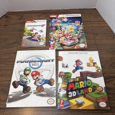 4x Mario Strategy Guide Game Book Lot - Mariokart 7 Super 3D Land Party 3