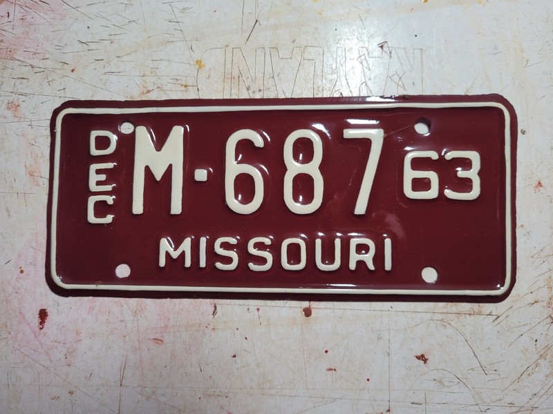 1963 Missouri Motorcycle license plate number M 687  nice correct repaint.