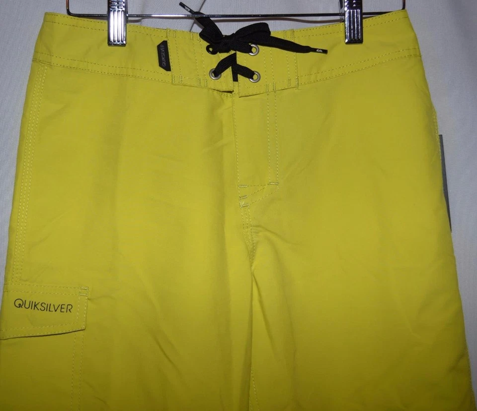 Bañador Quiksilver amarillo neón playa tabla surf pantalones cortos jóvenes niños 26 nuevo con etiquetas Foto 2 de 4