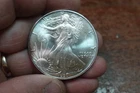 1990 1 OZ SILVER EAGLE UNCIRCULATED .999 FINE SILVER SOME TONING