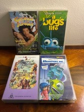 VHS Bundle Childrens Movies Bugs Life, Monsters Inc, Neverending 2, George Jungl