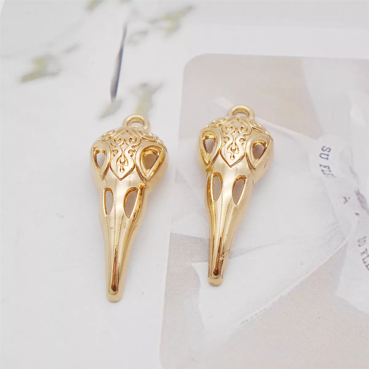 Gold raven deals pendant