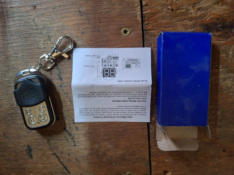 Mando a distancia ALEKO 433,92 MHZ para abridor de puertas transmisor remoto para llavero Foto 2 de 4