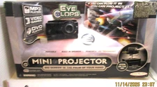 EYE CLOPS MINI PROJECTOR BIG SCREEN IN THE PALM OF YOR HAND BY JAKKS PACIFIC
