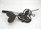 Vintage Griswold heart Cast Iron Patty Mold and shamrock with handles