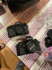 Nikon F3, Nikomat, and a 52 mm lens