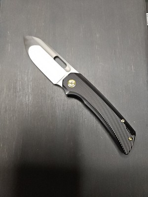 EMP RELATIVE TITANIUM FOLDING KNIFE