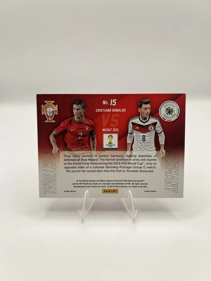 2014 Cristiano Ronaldo / M. Ozil Panini Prizm World Cup Matchups - Blue/Red Wave - Image 2 of 2