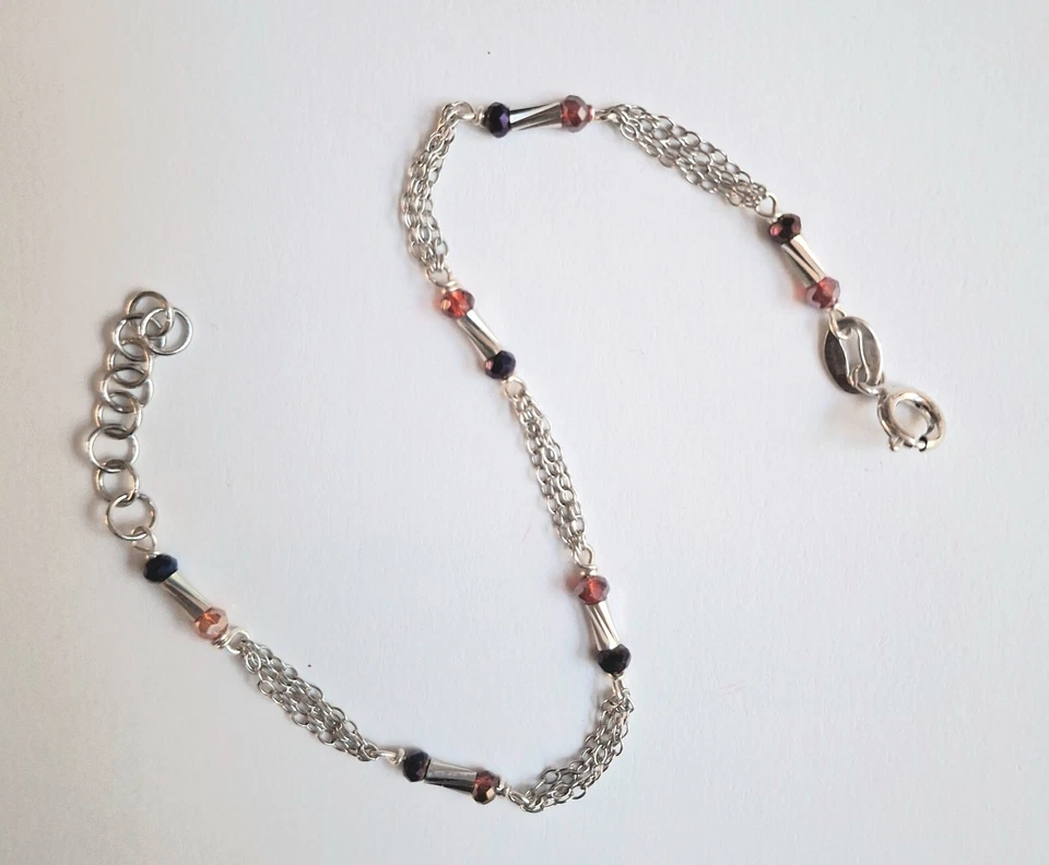 Bracciale in argento 925 con zirconia cubica neri e rossi e cilindri in argento - Immagine 2 di 3