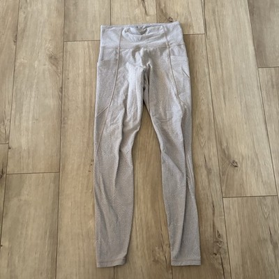 Athleta Salutation Stash Pocket  Printed 7/8 Tight Leggings Tan Patterned XS
