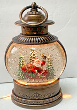 Lighted Santa on his Sleigh Christmas Globe 9  Glitter Snow Constantly Falls