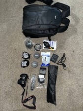 Canon EOS 2000D / Rebel T7 DSLR Camera with EF-S 18-55mm Lens  SanDisk 32GB Car