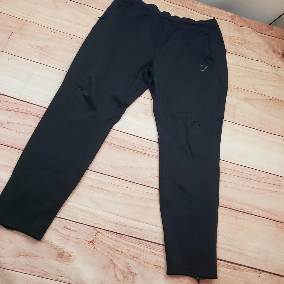 Calça Gymshark Masculina Grande Preta Joggers Bolsos com Zíper Cônico Tornozelo Zíper A1A3X - Imagem 2 de 4