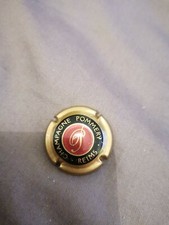 Capsule Pommery (P au centre Contour cuivre, interieur rouge) coté à 4