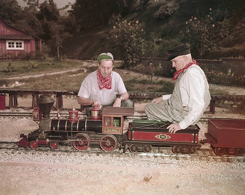 Walt Disney an unidentified engineer look over the Lilly Bell Disn- Old Photo