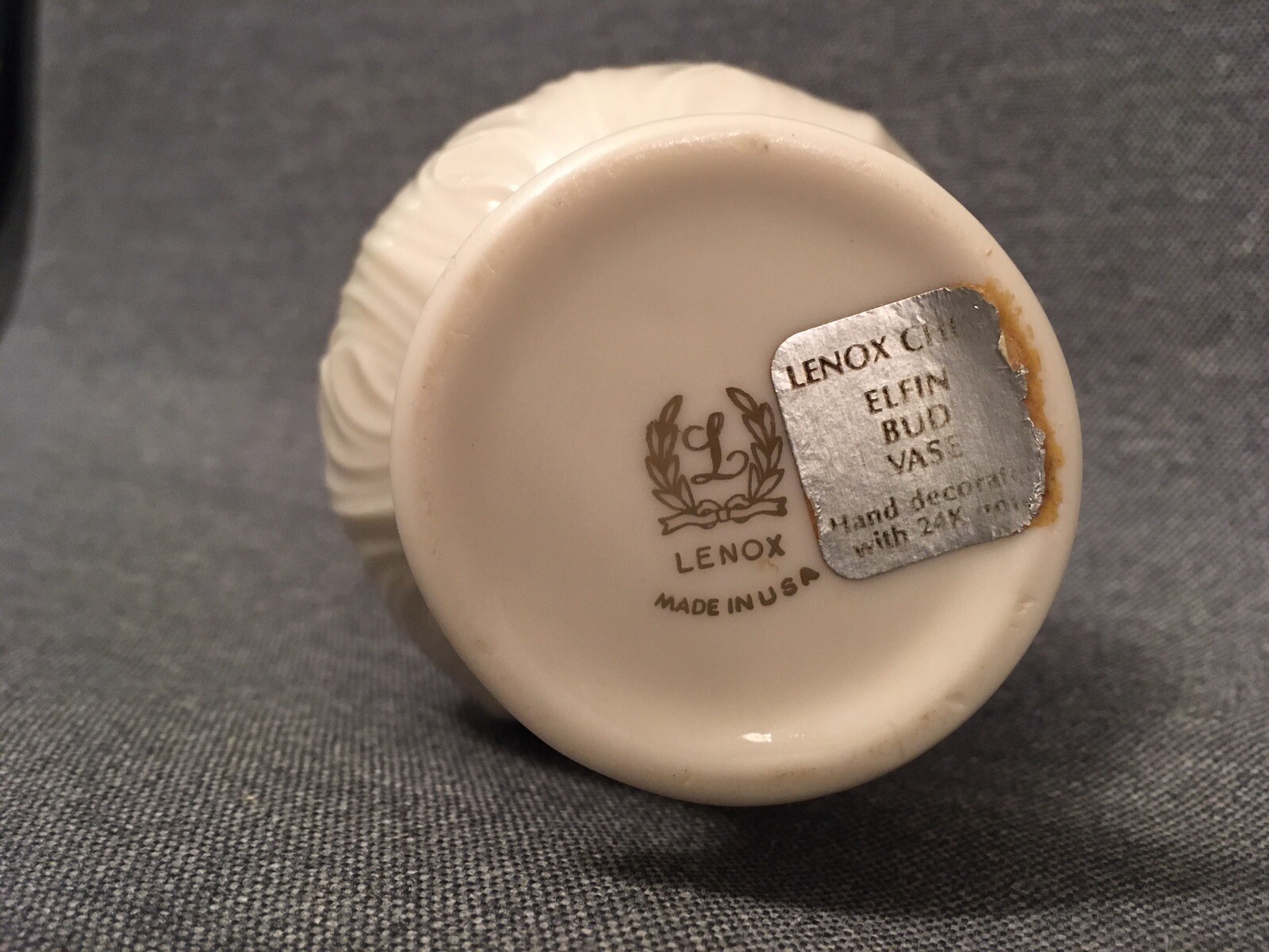 White ceramic vase with embossed elf design, silver Lenox logo, and “Made in U.S.A.” text on side.