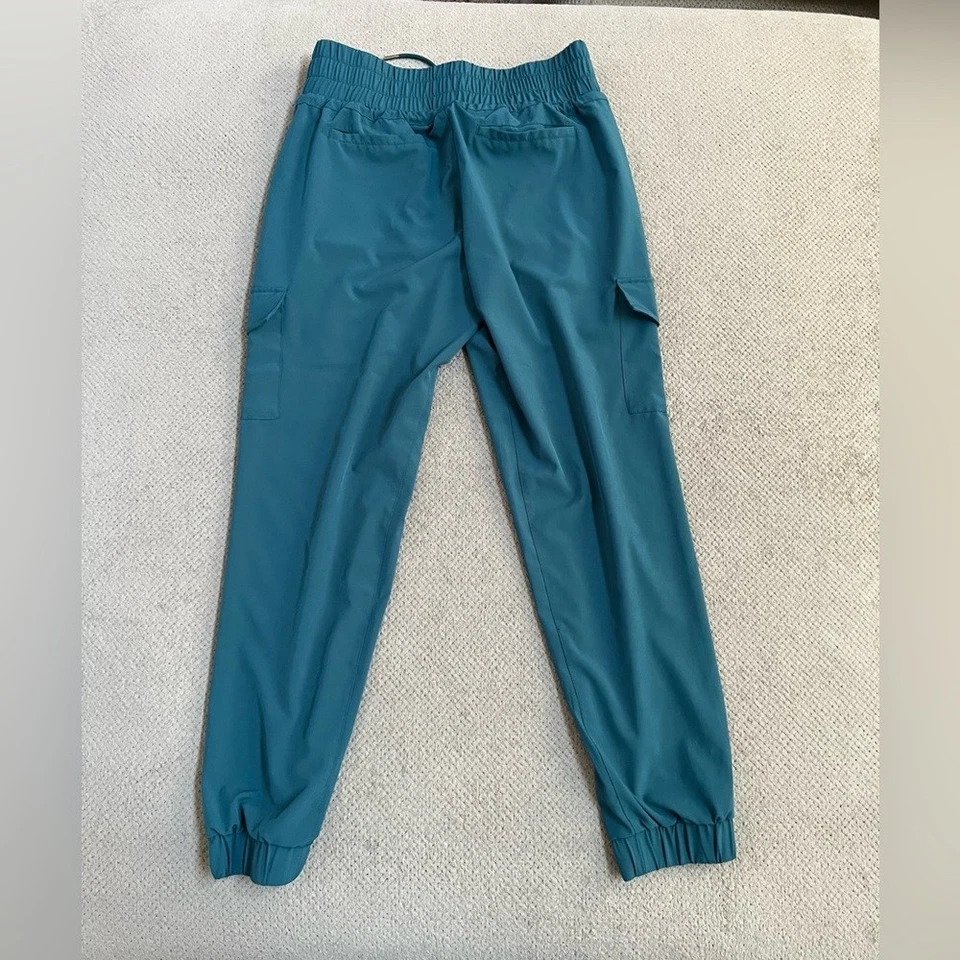 Pantalones de chándal recortados Kyodan para mujer pequeños verde azulado de ocio deportivo Foto 4 de 4