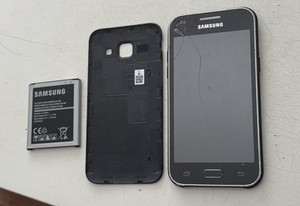 Samsung Galaxy J1 SM-J100H Schwarz Defekt - Platine Board Deckel Kamera Etc Ok