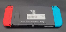 Nintendo Switch V1 Handheld Home Video Game Console 32GB Neon Red/ Blue w/ Dock