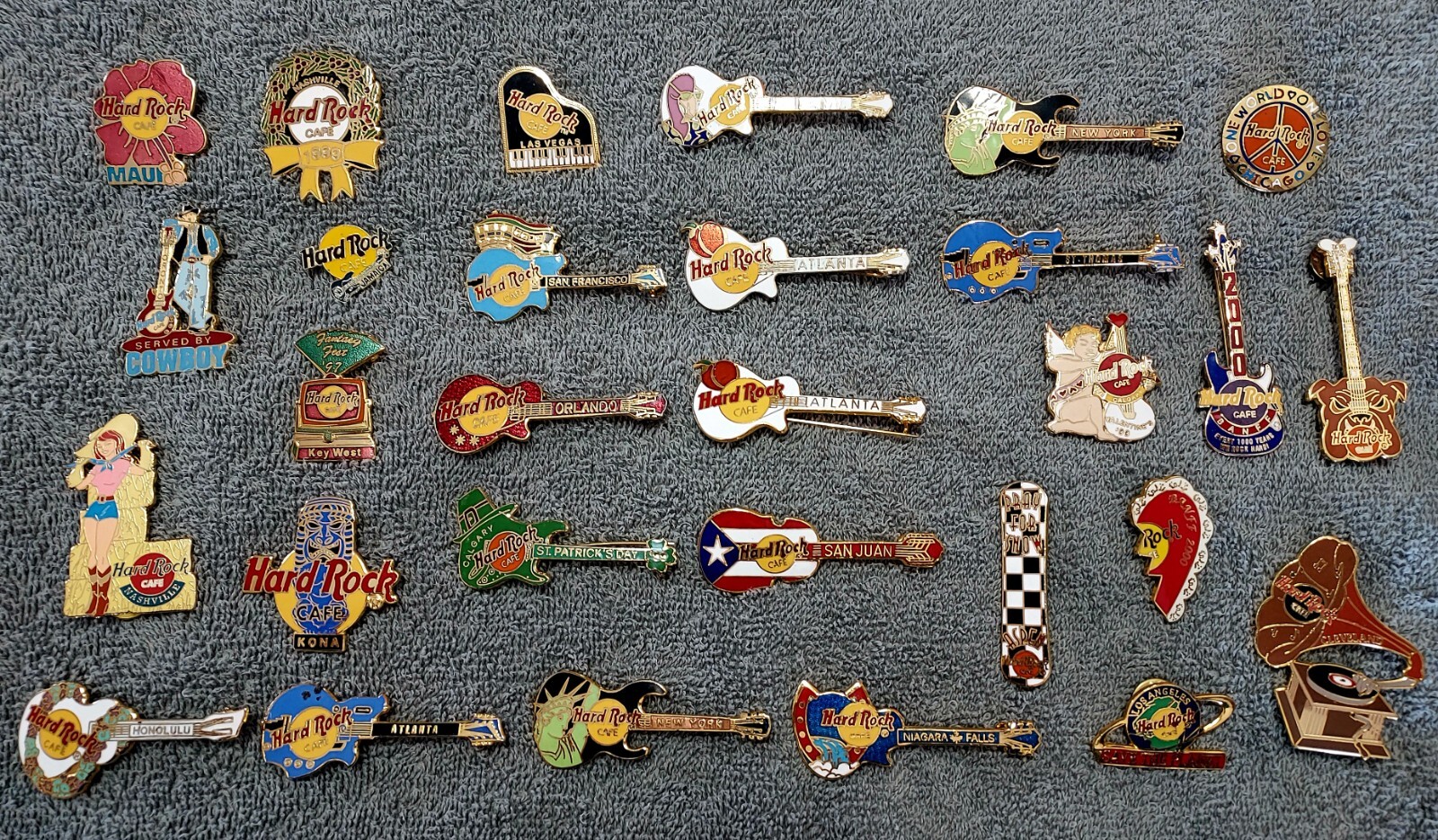 Hard Rock collector pins. 29 asst items total. - including (15 Guitar pins)
