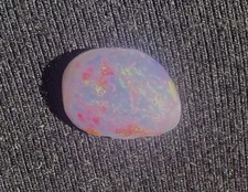 welo-crystal-opal-insane-hot-pink-fire-prepolished-cabochon-rub-36-carats