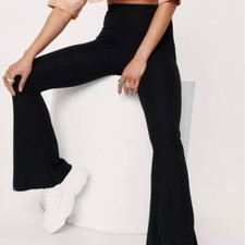 Nasty Gal NWT Petite Plisse Ribbed Lettuce Hem Flared Trousers in Black Size 2