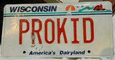 VTG WISCONSIN VANITY LICENSE PLATE &ldquo;PROKID&rdquo; SAILBOAT GEESE & BARN TYPE
