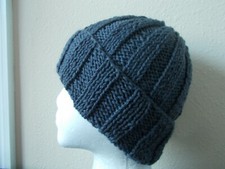 Hand knitted cozy and warm 100 wool hat, dark gray