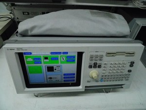 AGILENT 1670G LOGIC ANALYZER WITH CABLES. M7518