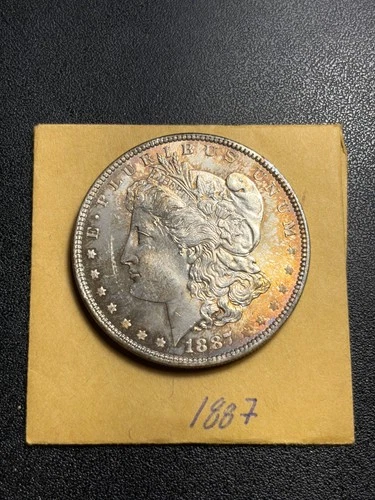 Morgan Silver Dollar 1887, circulated, nearly uncirculated details