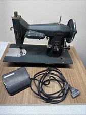Vintage Sears Roebuck Sewing Machine 117-552 cabinet model, runs