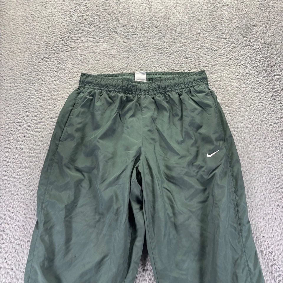 Pantalones de chándal vintage Nike para hombre medianos verdes de poliéster calce de malla forrados Foto 2 de 4
