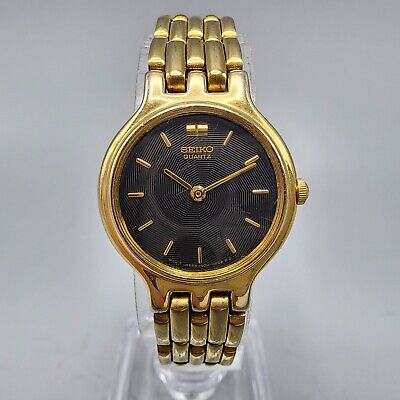 Seiko Watch Women 22mm Black Dial Gold Tone Round 1N00-0A90 Seiko Watch Women 22mm Black Dial Gold Tone Round 1N00-0A90