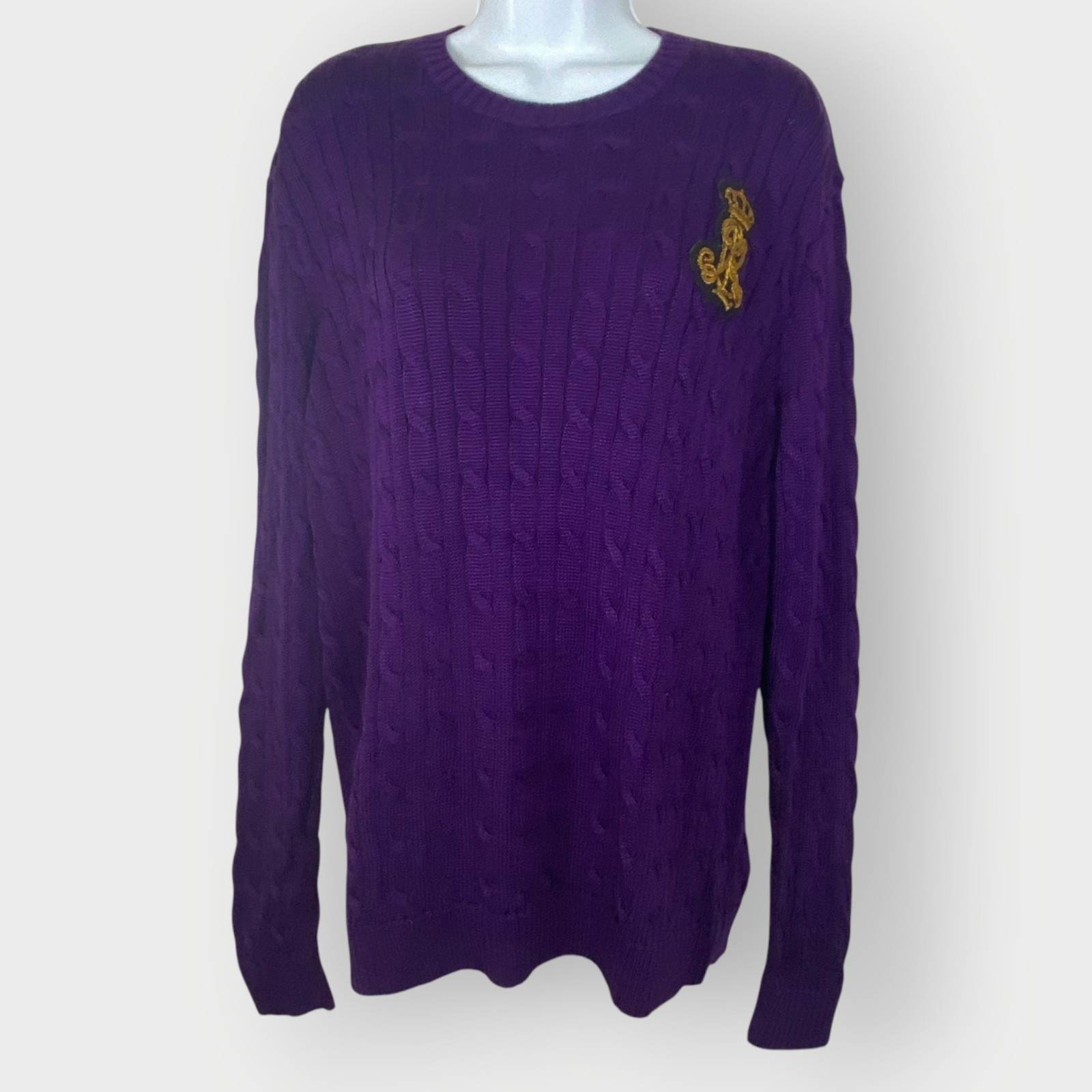 Deep purple chunky cable-knit sweater with an embroidered crest by Ralph Lauren.