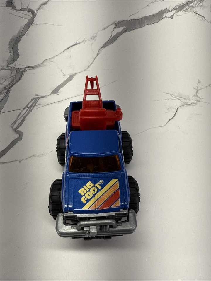 Camión monstruo Arco Big Foot 4x4 azul fundido a presión años 80 accionamiento por fricción camión de remolque de juguete Foto 4 de 4