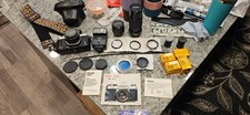 Pentax K-1000 Camera with Giant Lenses, Flash Attachments, Film, Filters