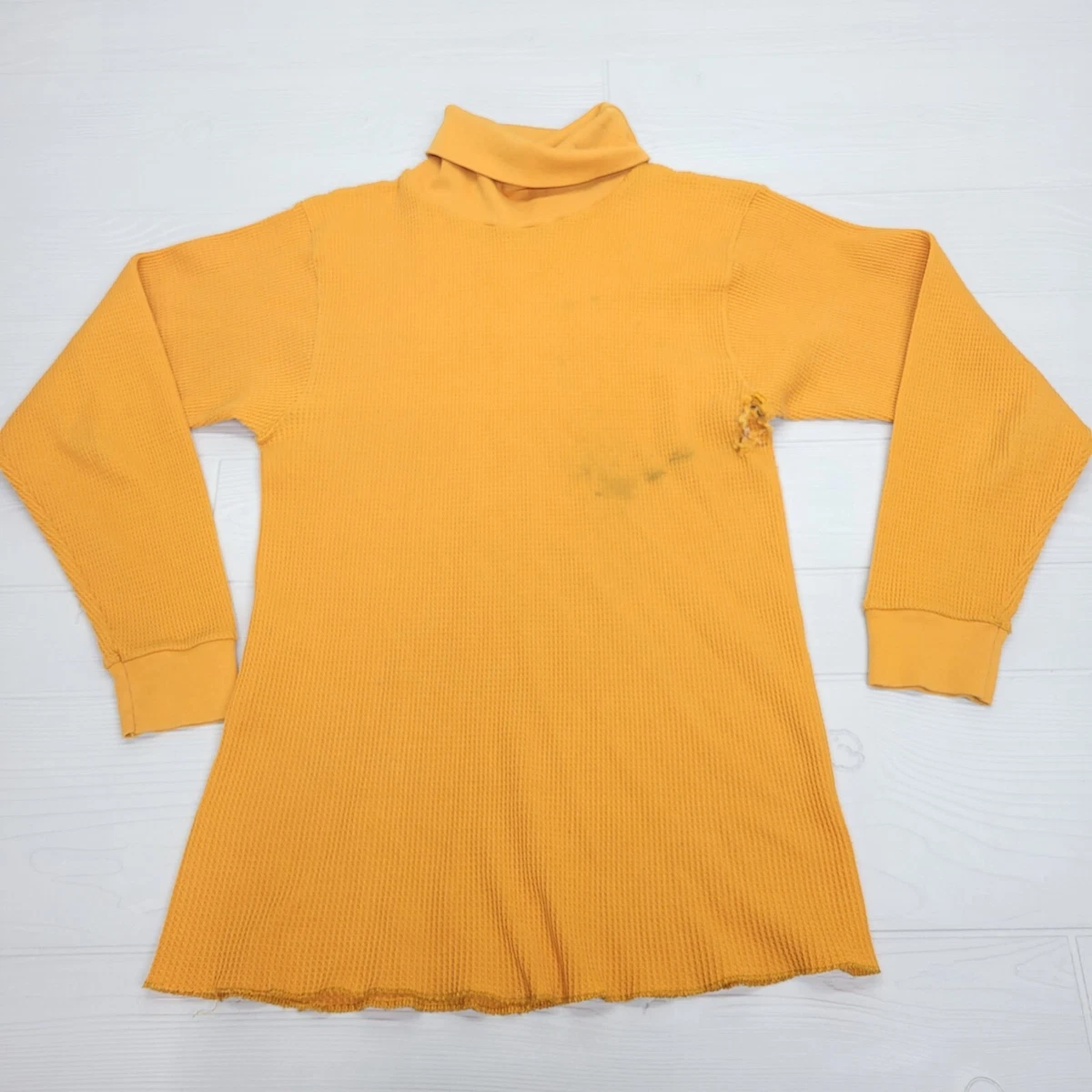 yellow turtleneck shirt