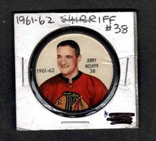 1961-62 Salada / Shirriff Plastic Hockey Coin #38, Blackhawks' Jerry Melnyk