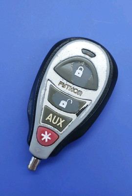 USED PYTHON 4-BUTTON EZSDEI7642 REMOTE TRANSMITTER FOB 7642P - TESTED