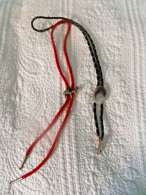 2 Mens Bolo ties with bullet ends. One has a donkey and the other cross section 
