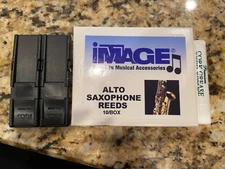 Nine Brand New Alto Saxophone Reeds with Clips & Cork Grease Never Opened